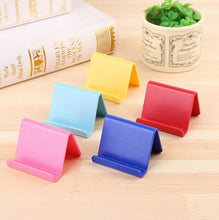 Load image into Gallery viewer, 2Pcs sky blue Portable And Fixed Stand For Mobile Phone And Remote Control AZ10156
